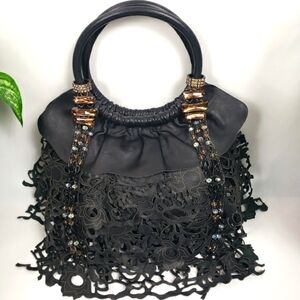Ileana Black Leather Tooled Cutout Satchel Floral Squish Handle 10 x 6.5